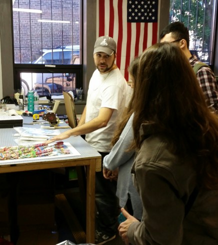 Oliver Tsai from South Williamsport High School on a tour of Charles Fazzino's 3d Art Studios